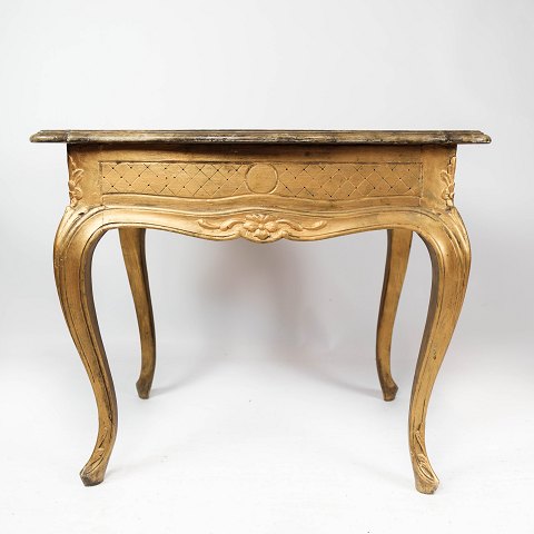 New Rococo side table with marbled tabletop and frame of gilded wood, in great 
antique condition from the 1860s.
5000m2 showroom.