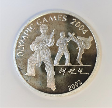 North Korea. Olympiad 2004. Silver coin 7 Won from 2002. Diameter 38 mm.