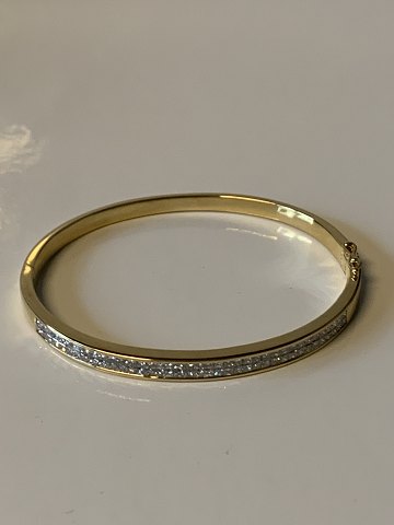 Armring 18 karat Guld med brillianter
Stemplet 750
Længde   59,66 cm ca
Højde 4,13 mm ca