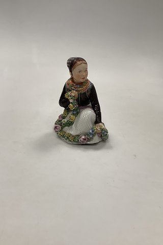 Royal Copenhagen Overglaze figurine of Amager Flower Girl No 12412