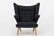 Hans J. Wegner / AP Stolen
AP 19 - Reupholstered Papa Bear chair in Clara 2 wool (code: 987) w. buttons in 
Savanne leather (color: Coffee). Paws and legs in oak.
Availability: 6-8 weeks
Renovated
