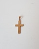 Cross in 14 kt gold 5.5 cm.