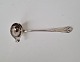 French lily cream spoon in silver from 1923