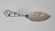 Beautiful ornamental decorated cake server in silver