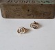 Earrings in 14 kt gold with brilliant