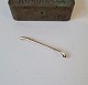 14 kt gold brooch in the form of a dressage whip