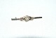 Brooch with white pearl in 8 carat Gold