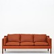 Børge Mogensen / Fredericia Furniture
BM 2213 - Reupholstered 3-seater sofa in Passion leather (colour: Burn, 33508) 
with dark wooden legs.
Availability: 6-8 weeks
Renovated
