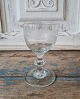 1800s wine glass Holmegaard Glasvoork. Wine glass on stem with button, decorated 
with matt sanded oak leaves with acorns. Height 10.8 cm.