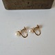 Vintage pearl ear screws in 14 kt gold by Viggo Wollny