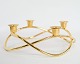 Advent candle Seasons braided bows of 18 carat gold-plated steel by George 
Jensen.
H: 9 Dia: 26
Great condition
