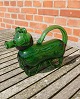 Swedish schnapps dog in dark green glass