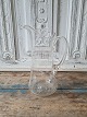 Beautiful old glass jug with white enamel decoration