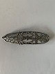 Brooch in Silver
Stamped 925s
Height 19.56 mm