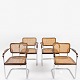Fritz Hansen
FH 6107 - Set of four armchairs in steel, stained beech and original French 
wicker. Designed in 1934.
1 set in stock
Original condition

