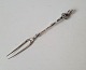 Cold cut fork in silver with a handle designed as a figurehead