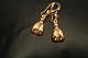 14 carat gold earrings with round shapes