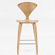 Cherner Bar Stool in white oiled oak.
Today, the Cherner chair is considered a modern icon in furniture design. The 
chair was designed in 1958 by influential American architect Norman Cherner. It 
achieved celebrity status in his home country when his namesake, the popular 
painter Norman Rockwell, depicted it in his painting, The Artist at Work, three 
years later.
The chair is available in se