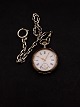 Silver pocket watch with chain