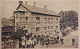 Postkort: Posten bringes ud i Brønderslev posthus I 1912