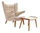 Hans J. Wegner “Papa Bear”. Wingback teak and oak easy chair with matching 
stool. AP 19 and AP 29