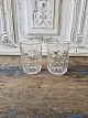 Vandglas dekoreret med måne og stjerner udført i presset glas