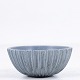 Arne Bang / Own workshop
Large fluted stoneware bowl with a light blue glaze. Signed at the bottom. No. 
189.
1 pc. in stock
Good condition
