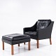 Børge Mogensen / Fredericia Furniture
BM 2207 - Lounge chair in original black leather incl. footstool with light 
walnut feet.
1 pc. in stock
Good, used condition
