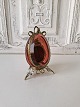 Art Nouveau egg-shaped clock case in raspberry-colored glass with gilded 
mounting