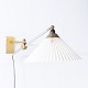 Orla & Peter Hvidt & Mølgaard / Le Klint
Rare wall lamp in brass with pleated shade.
1 pc. in stock
