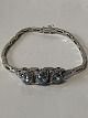 Gold bracelet in 14 carat white gold, with diamonds. Stamped 585 V.W