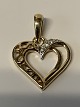 Pendant 14 carat gold, designed as a Heart
with clear stones.