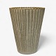 Arne Bang
Rifled stoneware vase with light brown glaze.
1 pc. in stock
