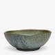 Arne Bang
Pentagonal stoneware bowl with blue-green glaze.
1 pc. in stock
