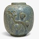 Arne Bang
Stoneware vase with ornament in blue-green glaze.
1 pc. in stock
