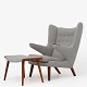 Hans J. Wegner / AP Stolen
AP 19 - Reupholstered Papa Bear Chair in new grey fabric w. stool (textile: 
Moss, colour 16 from Sacho).
ABOUT THE ITEM: This is an original ‘Papa Bear Chair’ by Hans J. Wegner, 
produced by the original manufacturer; AP Stolen. The chair is used, but has 
been reupholstered by our experienced upholstery workshop in Denmark. It appears 
as new and has a 2-year warrant
