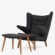 Hans J. Wegner / AP Stolen
AP 19 - Reupholstered Papa Bear Chair in new Hallingdal 65 fabric w. stool 
(colour: 173). 
ABOUT THE ITEM: This is an original ‘Papa Bear Chair’ by Hans J. Wegner, 
produced by the original manufacturer; AP Stolen. The chair is used, but has 
been reupholstered by our experienced upholstery workshop in Denmark. It appears 
as new and has a 2-year warranty. It is offer
