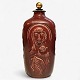 Jais Nielsen / Royal Copenhagen.
Tall lidded jar in stoneware (model 3544) with oxblood glaze and bronze lid by 
Knud Andersen. Signed.
1 pc. in stock
