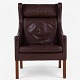 Børge Mogensen / Fredericia Furniture.
BM 2204 - Armchair in patinated, original dark brown leather with mahogany 
legs.
1 pc. in stock
