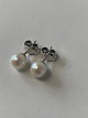 Pearl earrings in sterling silver for pierced ears.
SOLD