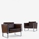 Hans J. Wegner / Johannes Hansen.
JH 801 - A pair of armchairs in original brown leather with metal frames.
1 set in stock
