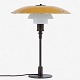 Poul Henningsen / Louis Poulsen
PH 4,5/3 - Bordlampe i bruneret messing med overskærm i gul-lakeret zinkskærm 
og mellem- samt underskærm i hvid opalglas. Stemplet 