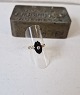 Beautiful old ring in 14 kt. gold with oval onyx adorned with old cut diamond