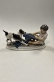 Dahl Jensen Figur af Foxterrier i leg med dreng No. 1072