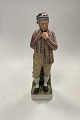 Royal Copenhagen Overglaze Figurine of Young man from Horne No. 12230