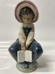 Lladro, Spansk figur: Pige med bog.Højde 21,5 cm.