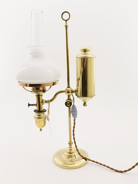 Oil studying lamp changed to electricity.