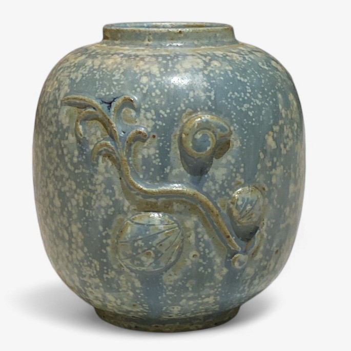 Arne Bang
Stoneware vase with ornament in blue-green glaze.
1 pc. in stock
