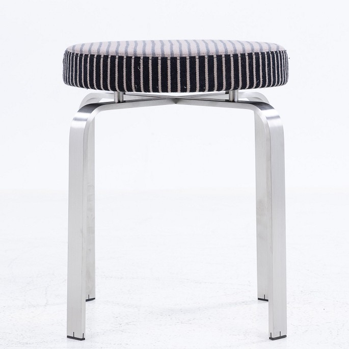 Jørgen Høj / Klassik Studio.
JH Stool with steel frame and upholstered seat in striped fabric from Kjellerup 
Væveri.
1 pc. in stock
