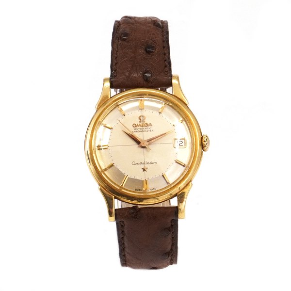 Omega Constellation Pie Pan i 18kt gold with box and papers ref. 14382 82SC sold 01.06 1961. Calibre 561. D: 34mm